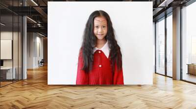 Portrait of pretty little girl in scarlet red dress with Crystals on forehead and smiling over white background. Wall mural