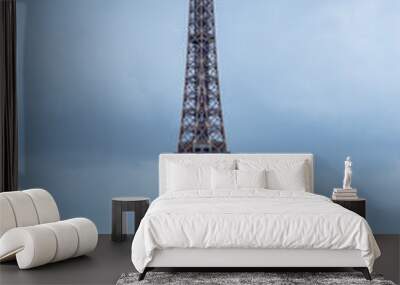 The eiffel tower on a cloudy day, in Paris, France. Wall mural