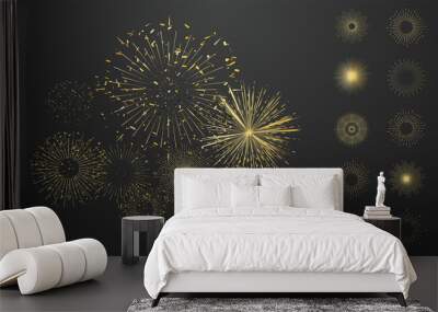 Set of isolated gold festive fireworks on a isolated background. Celebration fire show in night sky. Beautiful golden fireworks on black background. Bright decoration Christmas card, Happy New Year Wall mural