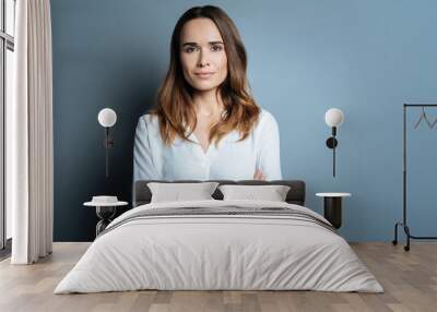 Confident beautiful businesswoman being ready to work Wall mural