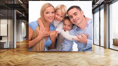 Happy family isolated on white background Wall mural