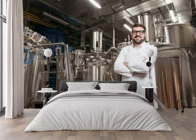 joyful man posing with brewing mechanisms Wall mural