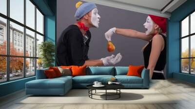 Portrait of funny mime couple with white faces and emotions isol Wall mural