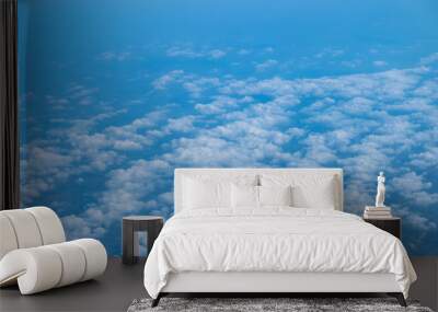 clouds seen from an airplane, blue sunshine, soil background nature landscape Wall mural