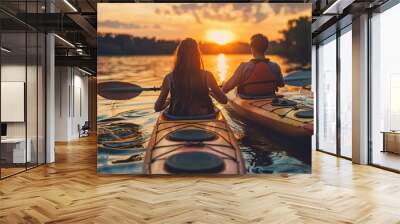 couple kayaking on the lake together at sunset. Have fun in your free time Wall mural