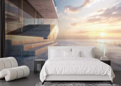 Modern, minimalist building exterior with concrete steps and ocean view at sunset. Concept of architecture, design, luxury, and tranquility. Wall mural