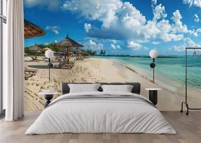 Panoramic view of Mauritius beach with chairs and umbrellas, popular luxury resort Wall mural