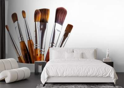 Art brushes in paint in a creative pot on a white background with space for copy and text. Wall mural