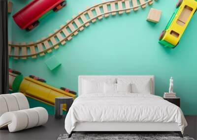 Baby kid toys background. Toy train and wooden rails on light green background. Top view, copy space
 Wall mural