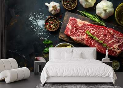 Food background with Fresh marbled beef rib eye steak, butter and spices Wall mural