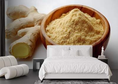 Fresh ginger root and ground ginger powder in wooden bowl.
 Wall mural