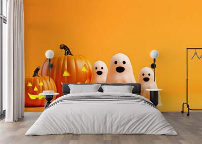 Halloween ghosts with funny pumpkin on orange background. Happy halloween holiday concept. Wall mural