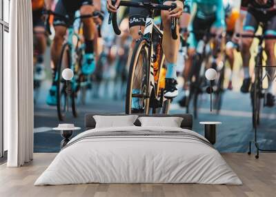 Close-up of a group of cyclists with professional racing sports gear riding on an open road cycling route
 Wall mural