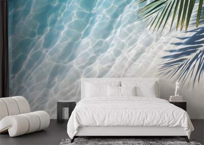 top view of water surface with tropical leaf shadow. Shadow of palm leaves on white sand beach. Beautiful abstract background concept banner for summer vacation at the beach.
 Wall mural