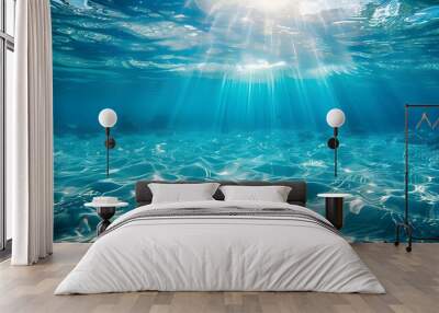 Tranquil sea water surface on a sunny day, Underwater sea in sunlight, tropical blue ocean underwater background Wall mural