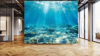 Tranquil sea water surface on a sunny day, Underwater sea in sunlight, tropical blue ocean underwater background Wall mural