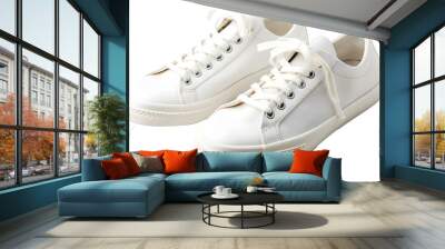 White leather sneakers with shoelaces bows isolated on white background Wall mural