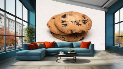 Group of cookies with chocolate crumbs on the kitchen table Wall mural