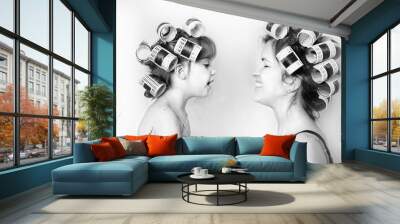 vintage image of a mother and daughter wearing rollers in their hair and having a good time Wall mural