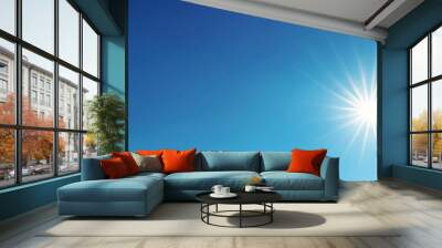 Shining sun in a clear blue sky with copy space Wall mural