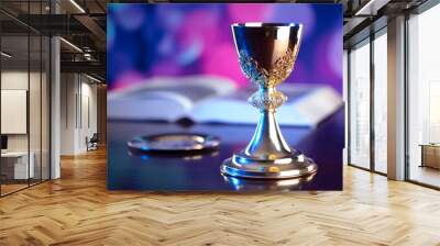 Religion theme. Religion symbols composition. The Cross, monstrance,  Holy Bible, rosary and golden chalice on blue bokeh background.  Wall mural