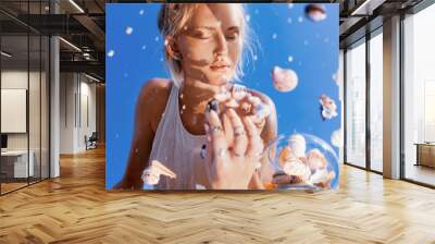 beautiful young woman model reflection in mirror portrait with sea shells Wall mural