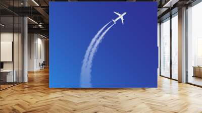 Vector illustration of plane loop and arc track or trails with white smoke on blue sky background Wall mural