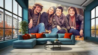 group of Friends having fun at the park  in autumn Wall mural