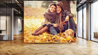 romantic couple in love at the park in autumn Wall mural