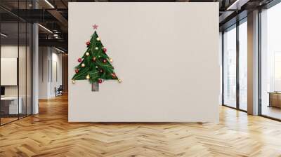 Text or logo empty copy space in vertical top view cardboard with natural eco decorated christmas tree pine.Xmas winter holiday season party social media card background  Wall mural