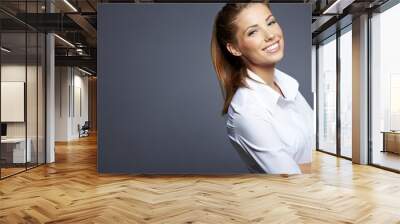 beautiful businesswoman portrait, gray background Wall mural