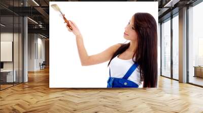 beautiful woman painting a wall  - isolated over a white backgr Wall mural