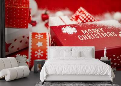 Christmas gift box and decorations over festive background. Christmas holiday celebration concept Wall mural