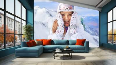 Close up portrait of a woman at a snow ski center. Wall mural