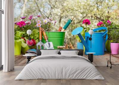 Outdoor gardening tools on old wood table Wall mural