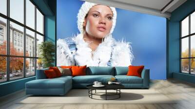 portrait of beautiful young woman wearing fashion winter clothin Wall mural