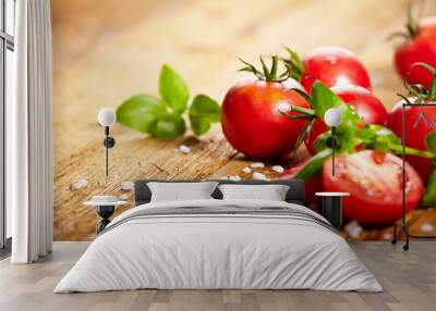 Tomatoes lying on old table. Diet food Wall mural