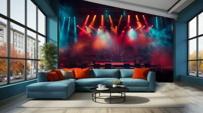 Dark concert stage with fog, illuminated by array of spotlights, casting a red and blue light creating a dramatic effect. Copy space, 16:9 Wall mural