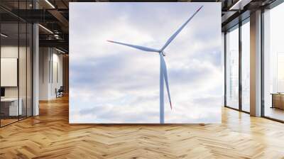 Wind turbine with cloudy sky in background Wall mural