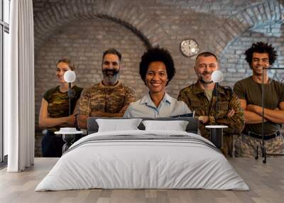 Portrait of smiling diverse veterans at PTSD support group. Wall mural