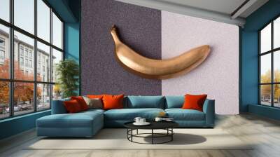 Blue banana on pink background Wall mural