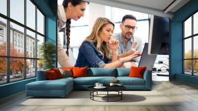 Group of business people and software developers working as a team in office Wall mural