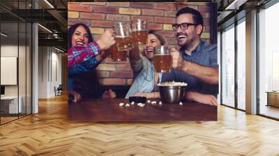 Two couples went on a double date to pub on a saturday night.  Wall mural