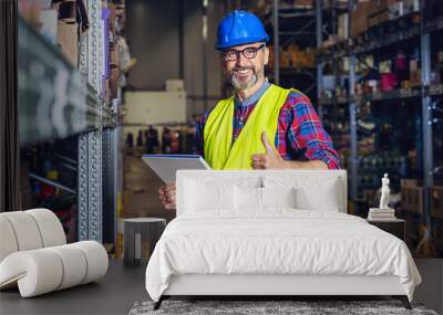 Warehouse worker with clipboard in warehouse Wall mural