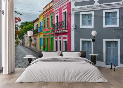 The historic architecture of Olinda in Pernambuco, Brazil with its colonial buildings and cobblestone streets at sunset. Wall mural