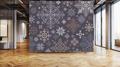 Seamless knitted pattern with gray, beige and white snowflakes Wall mural