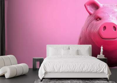 A cute pink piggy bank sitting against a soft pink background, symbolizing savings and prosperity. Wall mural