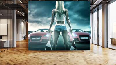 sexy blonde woman starts racing Wall mural