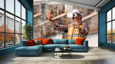 Senior engineer wearing AR goggle and browsing work area thought the virtual reallity. Technology Virtual reallity for industrial work space. Wall mural