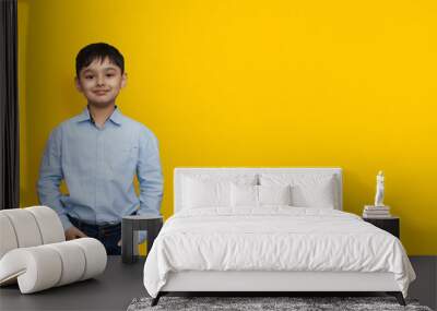 Little boy wearing formal shirt isolated on a plain background print mockup concept copy space Wall mural